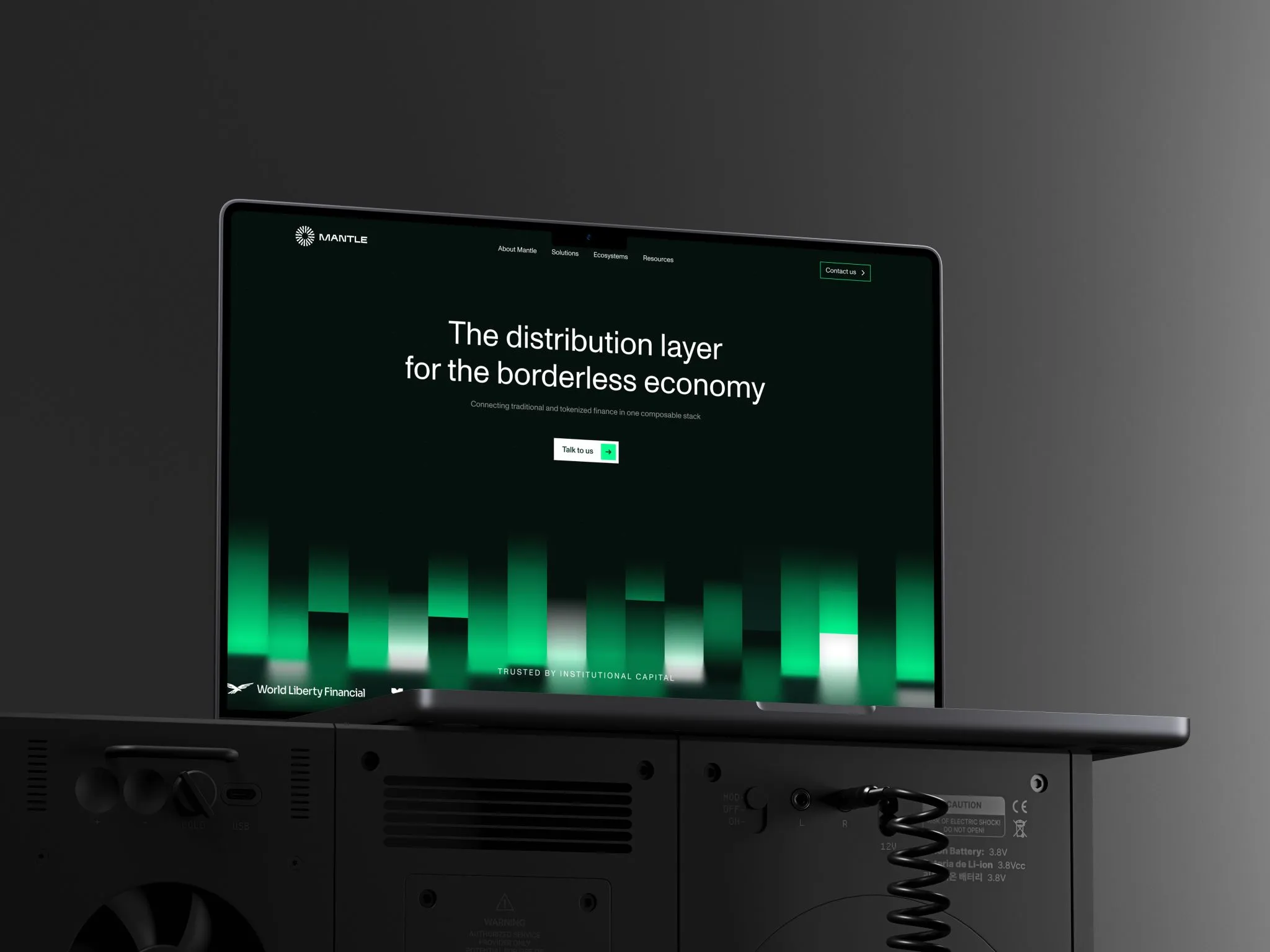 A laptop showing Mantle's homepage, the distribution layer for the borderless economy
